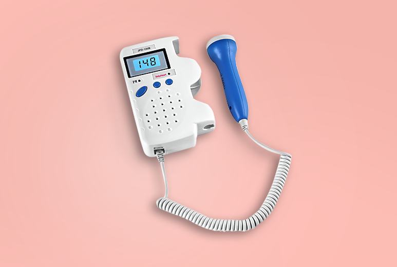 Product shot of the Babyheart Advanced Fetal doppler on a pink background