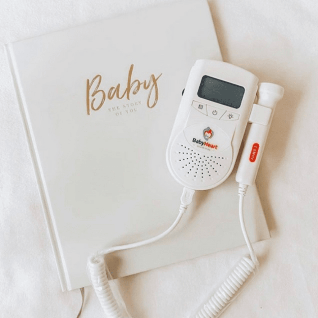 BabyHeart Standard Doppler on a Baby book - photo shoot